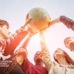 Multiracial Teen Couple Holding Globe Map - stock